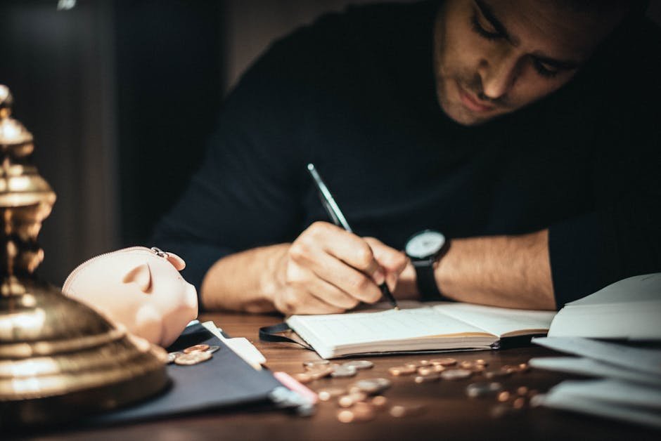 Investor reviewing financial paperwork at a desk